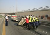 شاهد الصور...نجاة بحريني بانقلاب سيارة بنفق أم الحصم