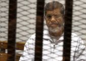 تأجيل محاكمة مرسي و10 آخرين لاتهامهم بالتخابر مع قطر إلى الغد