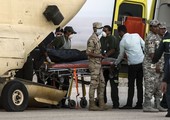 وصول الطائرة التي تنقل جثامين 144 ضحية من الطائرة الروسية المحطمة إلى روسيا