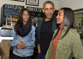شاهد الصور... اوباما يتسوق بصحبة ابنتيه لدعم المشروعات الصغيرة