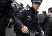 الصين تعتقل خمسة آخرين بشأن انهيار أرضي قاتل