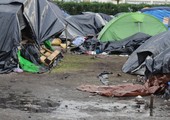بلجيكا تدعو فرنسا لإيجاد حل لوضع مخيم كاليه