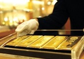 الذهب يهبط مع صعود الأسهم والدولار قبل اجتماع المركزي الأوروبي