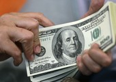 الدولار يتراجع قبيل تقرير الوظائف الأميركية