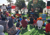 ركن العرائس يجتذب أطفال الفورمولا1