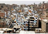فنان تونسي يحول جدرانا بالقاهرة لتحفة فنية