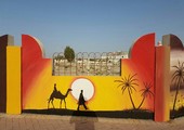 بالصور... بني جمرة تزدان بـ 67 جدارية بمشاركة 16 فناناً من القرية