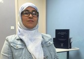 كفيفة تكتب ترجمة فرنسية لمعاني القرآن بطريقة بريل