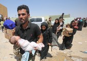 الصليب الأحمر: ما يصل إلى مليون شخص قد يفرون من القتال بالعراق