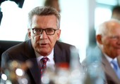 وزير الداخلية الالماني يدعو إلى حظر جزئي للنقاب