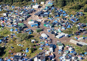 فرنسا تخلي مخيم كاليه وتعيد توطين المهاجرين