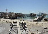 بلدية المحرق تنفذ حملة لإزالة الكبائن المخالفة على ساحل الغوص