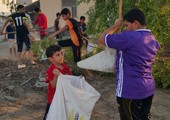 بالصور...العشرات من الشباب والأطفال يتطوعون بتنظيف مقبرة السيد محمد في منطقة مروزان