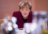 ميركل وأولاند يجتمعان في برلين قبيل قمة الاتحاد الأوروبي