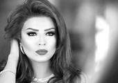 بالصور... أمل بوشوشة حامل بمولودها الأول