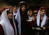 بالصور: أيزيديون يحتفلون بعيد رأس السنة في شمال العراق 
